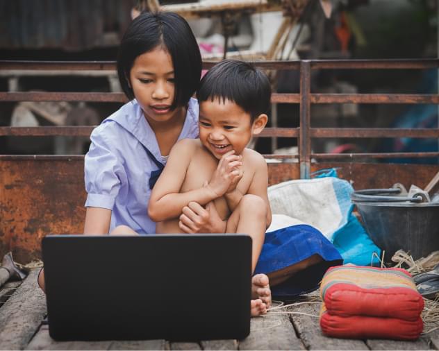 mother son using laptop